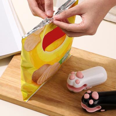 Mini-Katzenpfoten-Beutelversiegler mit Schneider, USB-wiederaufladbar, tragbar, für Snacks, Lebensmittel, Vakuumbeutel, Heißversiegelung