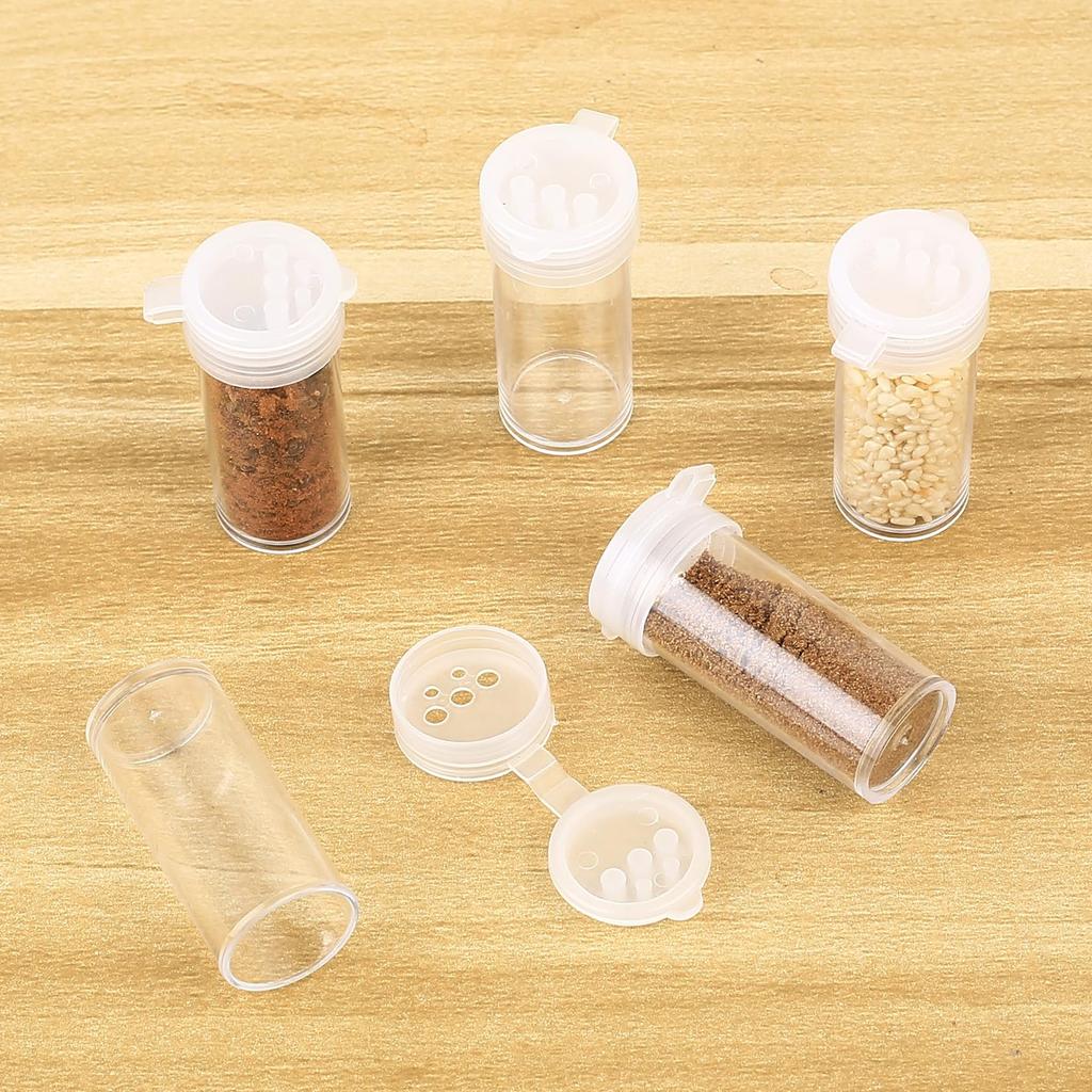 Mini-Reisegewürzflasche tragbare Kunststoffmühle transparente Farbe 12 Stück
