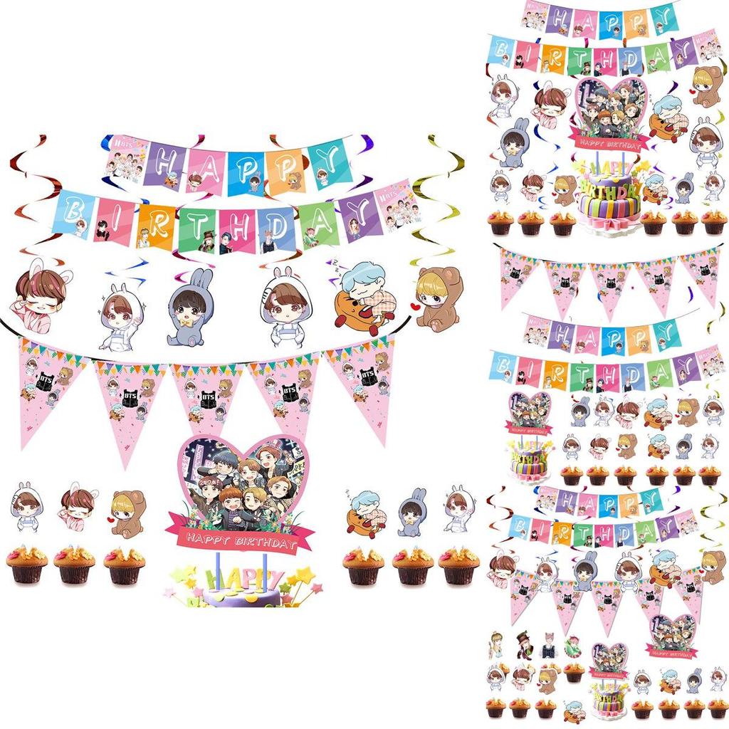 Fournitures de fête d'anniversaire festives sur le thème de BTS avec un cake topper coloré et des cupcake toppers joyeux