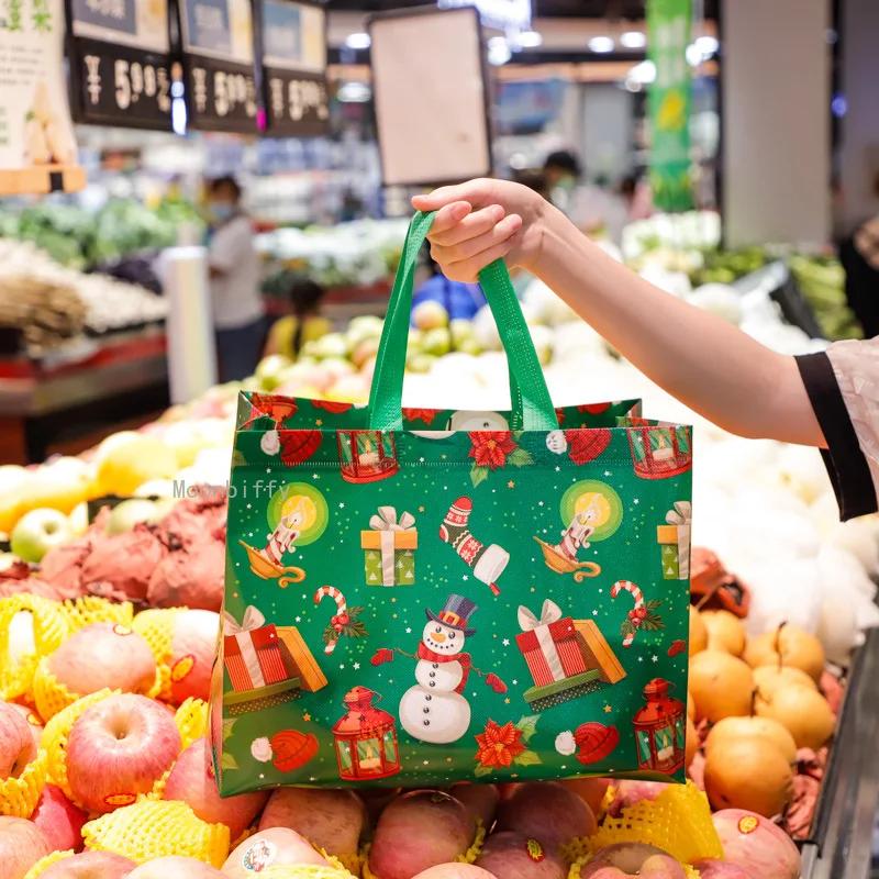1PC New In Christmas Gift Bags Cartoon Cute Print Santa Elk Snowman Printing Non Woven Foldable Storage Handbag Party Supplies