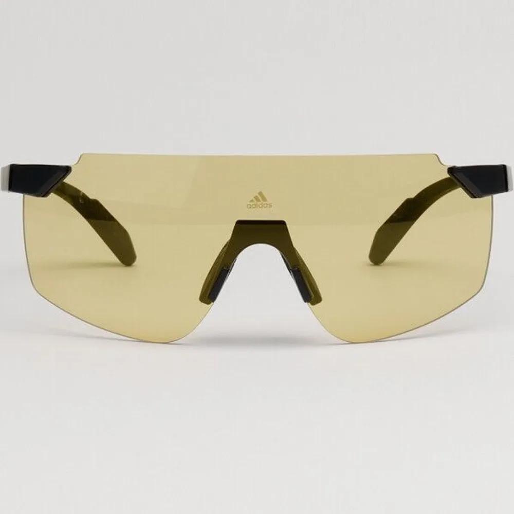 [adidas] Photochromic Sports Sunglasses for Cycling, Running, Hiking, Day & Night Clear Yellow SP0056 02J