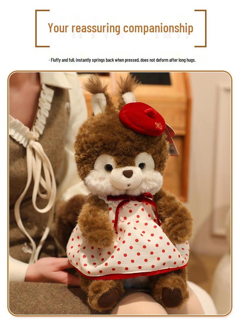 Entzückendes Haselnuss-Kakao-Eichhörnchen-Stofftier mit gepunktetem Rock - Perfekter Schlafbegleiter für Kinder.