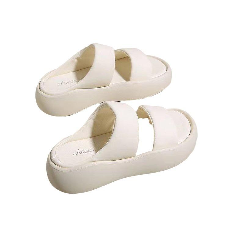 Lädertofflor med tjock sula för damer sommar 2025 nya high-end internetkändis ett ord tofflor trampa i skit vardagssandaler