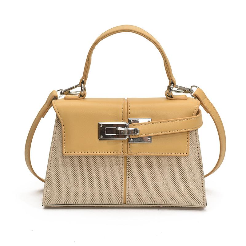 Korean version of high-quality, simple and versatile commuter handbag women's 2025 summer new niche messenger small square bag