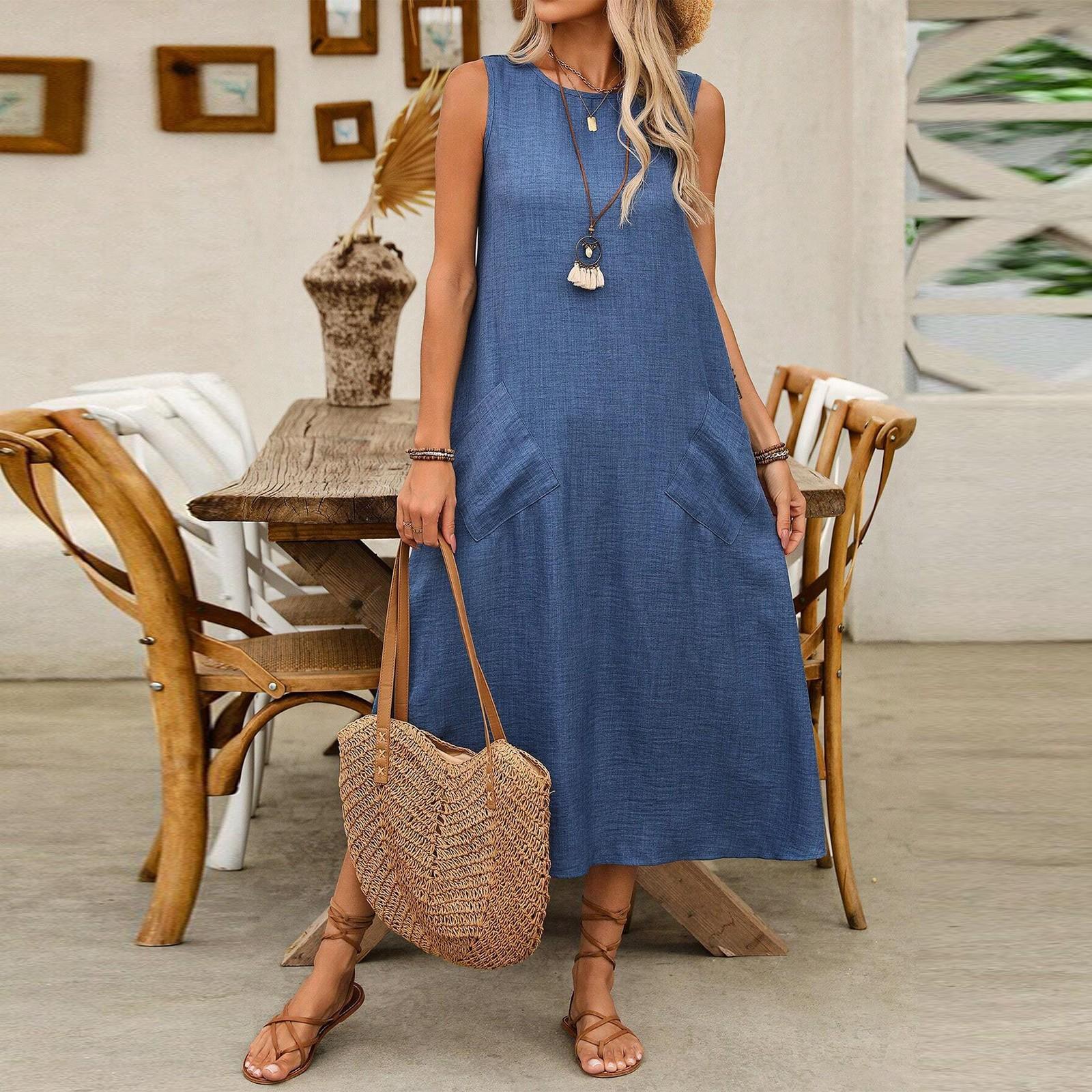 

Жіноча модна однотонна сукня-жилет без рукавів на кулісці з круглим вирізом та кишенею, повсякденна L синій