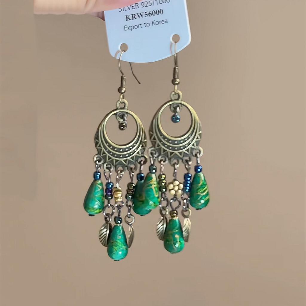 Exotic high-end fringed earrings, niche retro ethnic style earrings, French heavy industry bohemian earrings.