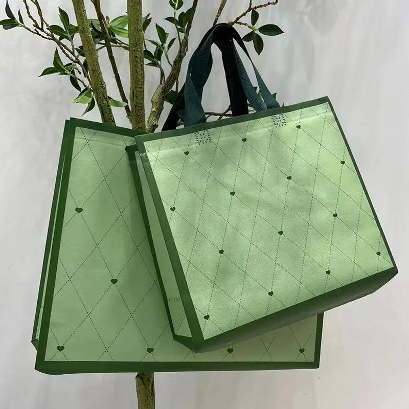 10PCS Rose Printing Packaging Shopping Bag Handle Waterproof Non Woven Fabric Gift Bags Black Clothing Store HandBag