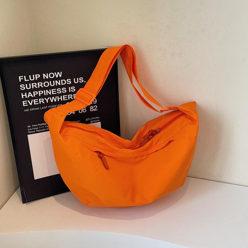 2025 women's bag Korean version ins canvas dumpling bag fashion casual messenger bag simple breast bag trendy bag