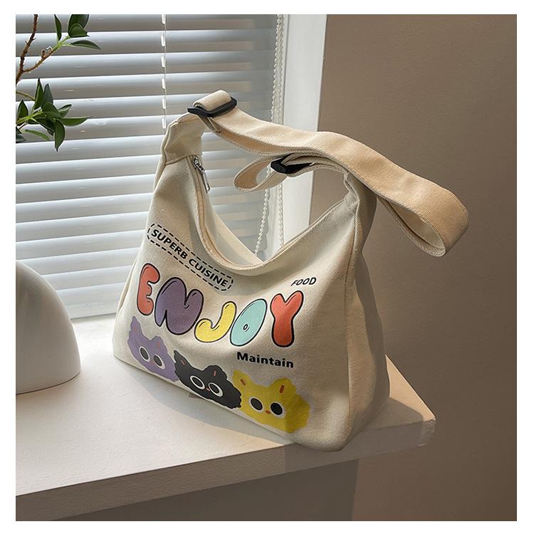 Canvas Bag Women's Large-capacity Bag New Fashion Cartoon Letter Casual Shoulder Messenger Bag