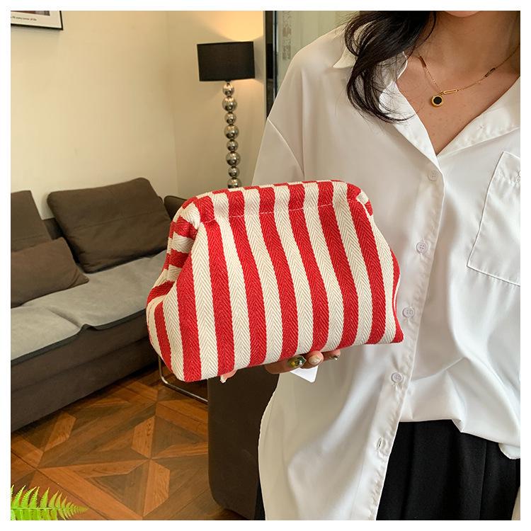 Trendy Color Block Stripe Makeup & Coin Storage Clutch for Women