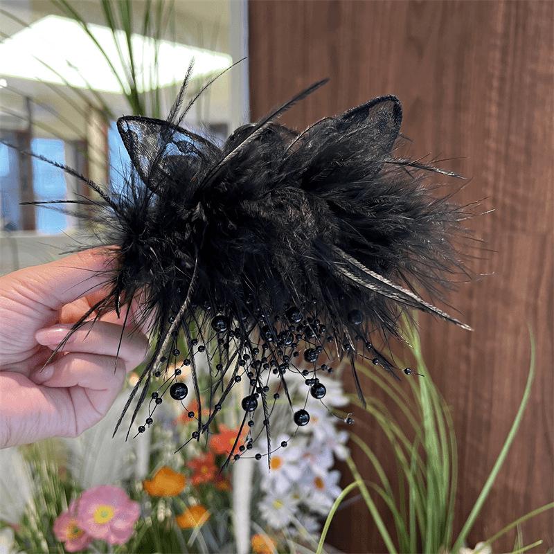 Elegance: Black Rabbit Ear Feather Tassel Claw Clip for Women – 2024 Autumn/Winter High-End Luxury Hair Accessory