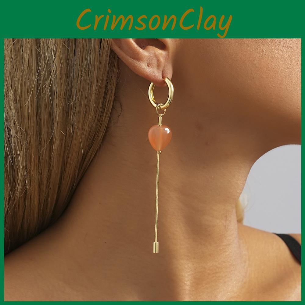 Stilvolle Damen-Ohrringe mit goldener Herzkette und geometrischem Design für den Herbst