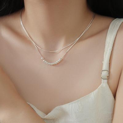 Collier multicouche en perles élégant et minimaliste Design unique Chaîne avec pendentif très brillant pour femmes