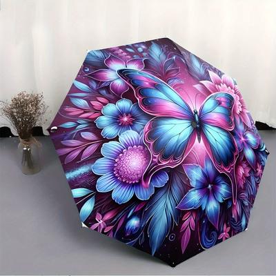 Ombrello Pieghevole L'ombrello presenta un vivace motivo di una grande farfalla blu e rosa circondata da vari fiori colorati