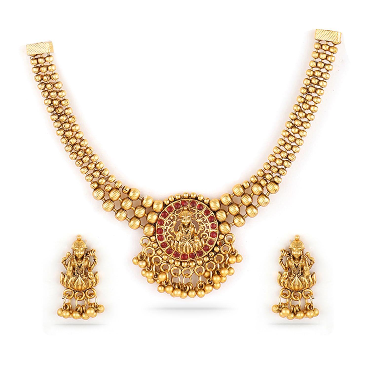 

Brass Red Stone Studded Lakshmi Motif Temple Necklace Set For Women