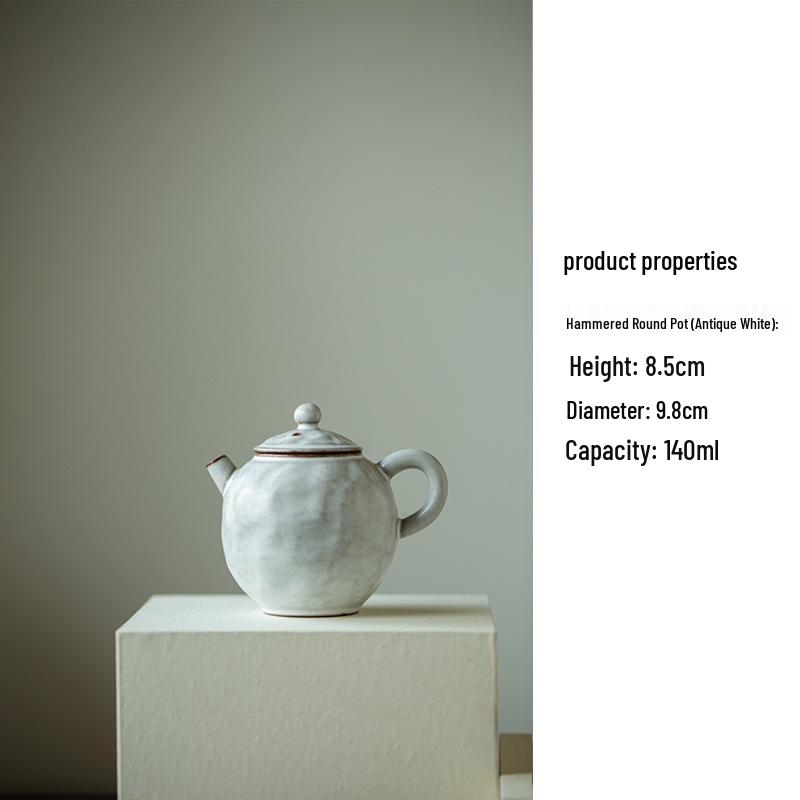 

Fan Yi Wabi-Sabi Style Hammered Teapot with Filter - Cool-to-Touch, Fine Pottery Tea Infuser, Semi-Handmade. Hammered Ancient Pottery Series