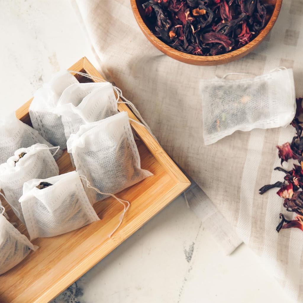 uxcell Disposable Tea Bags, Empty Non-Woven Tea Filter Bags with String Seals, 200 Bags, 12 x 10 cm