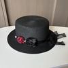 Pastoral streamer flower straw hat women's summer seaside vacation sun hat French flat top top hat sun hat