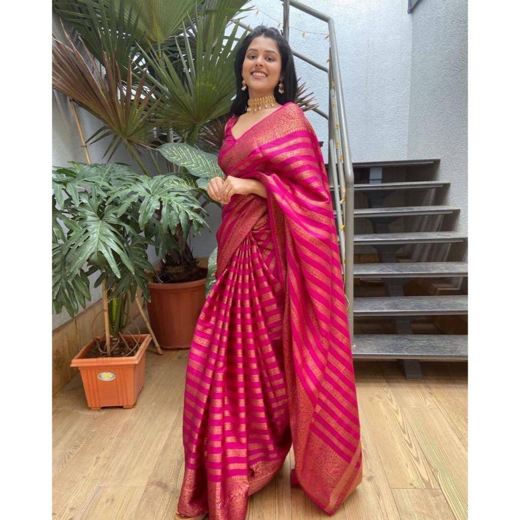 Silk Saree from the ALMAARI store is adorned with beautiful Zari work in form of traditional motifs.