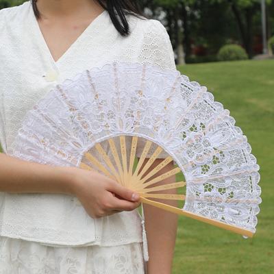 Vintage Style Folding Fan with Lace Trim And Tassel Pendant Elegant Fabric And Bamboo Handheld Fan Hollowed Hand Fan