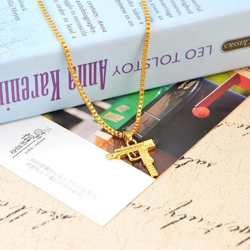 Unisex Herren Gold Maschinengewehr Anhänger Halskette Lange Kette Modeschmuck Halskette Großhandel Herren Halskette