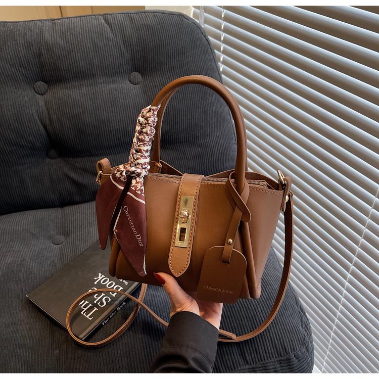 

Casual handbag bag women s new texture versatile single shoulder crossbody design bucket bag темно-коричневого кольору