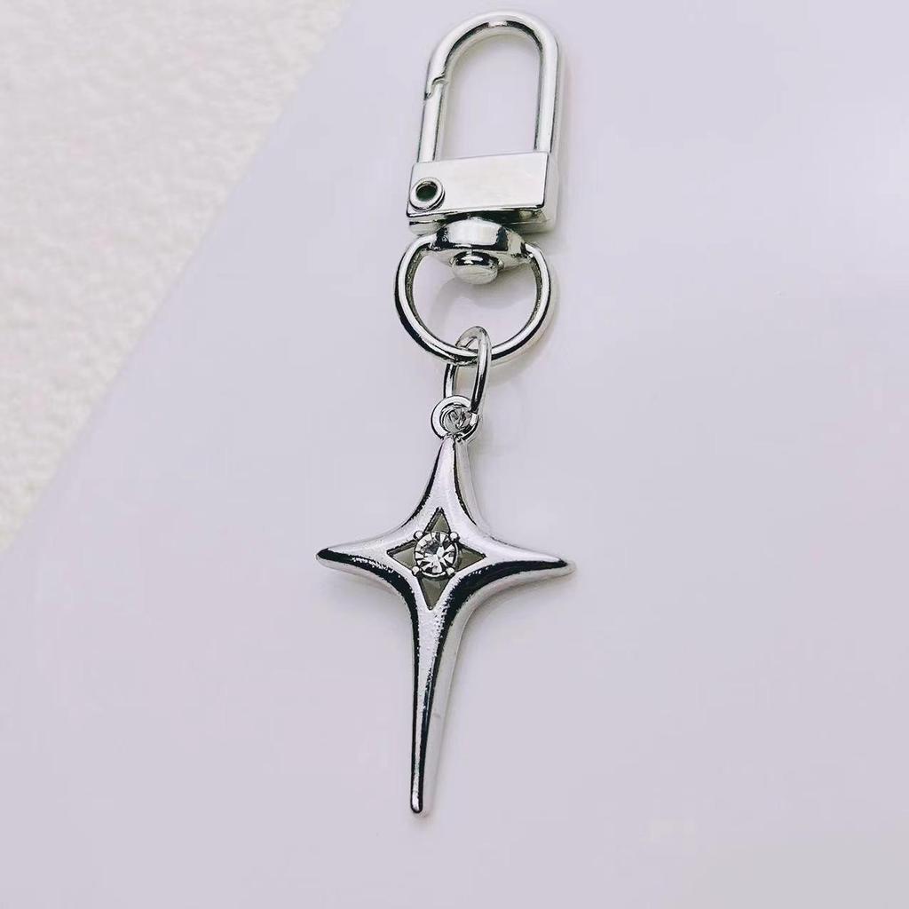 Elegant Star and Moon Hollow Keychain - Unisex Fashion Bag Pendant.