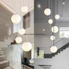 Minimalist Rotating Stair Chandelier: Irregular Long Duplex Pendant with Large Round Ball In Cream