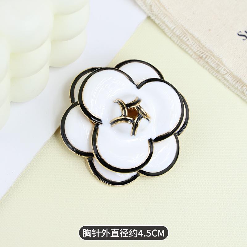Korean simple retro Phnom Penh camellia brooch high-end women's rose corsage alloy badge clothing accessories