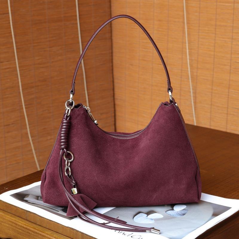 

This Handbag Is Made of Fashionable Cowhide and Genuine Leather. It Is A Hand-held, Underarm, Single-shoulder Bag One Size фіолетовий/вина червоного кольору
