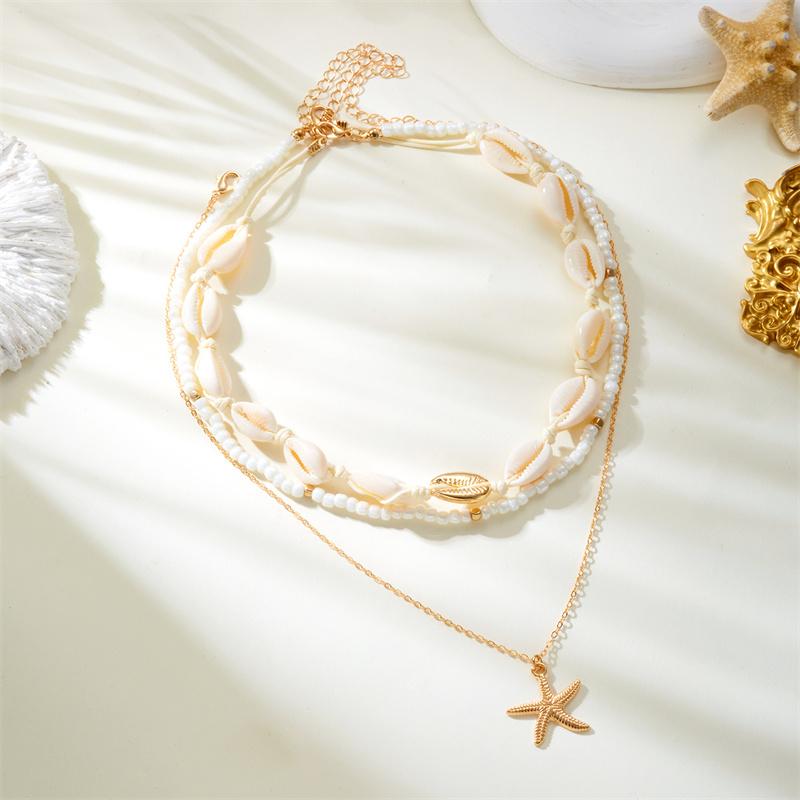Layered Cowrie Shell Necklace for Women Boho White Beaded Choker Golden-Tone Conch Pendant Summer Beach Vacation Jewelry