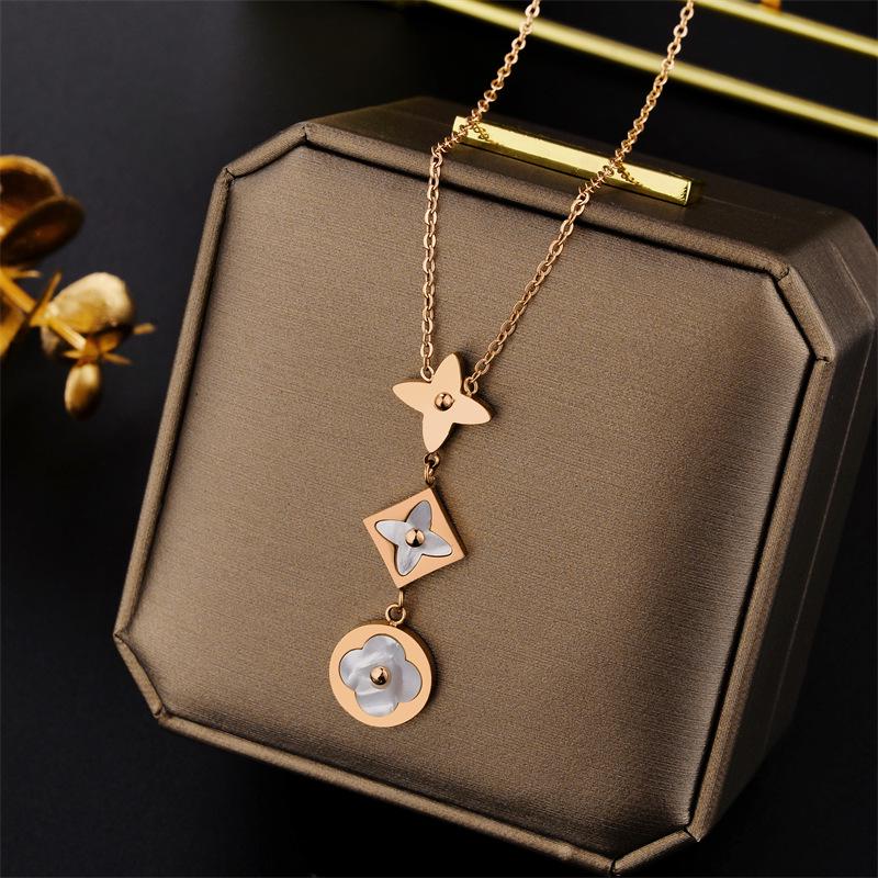 Elegant Colorfast 18K Rose Gold Necklace with Swan & Four-Leaf Clover Charm