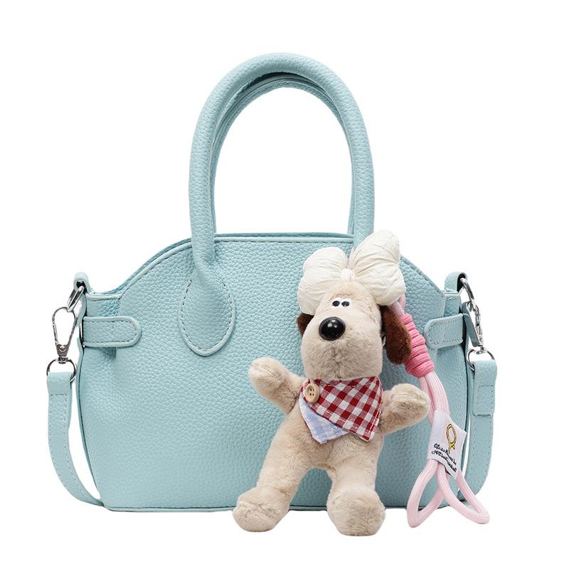 Spring and summer popular Korean version niche sweet lychee pattern portable shell bag fashionable simple style commuter versatile messenger bag