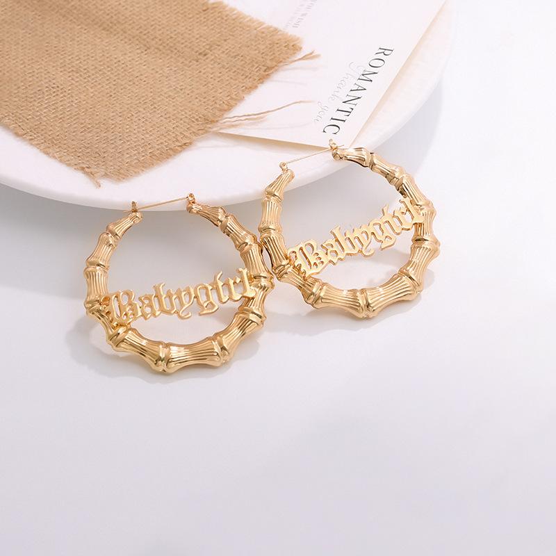 European and American fashion hollow letter mix and match punk earrings women's temperament bamboo ring personality retro stud earrings
