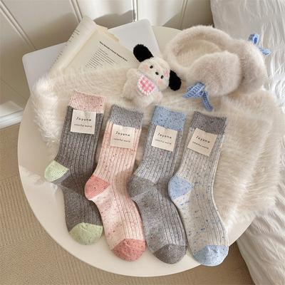 Girls Who Keep Their Feet Warm In Autumn and Winter Can Come Up with Some Warm Woolen Socks. Multicolored Mid-calf Socks Are Versatile for Ladies