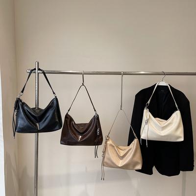 Bolsa de axila de cor sólida com textura de moda tendência nova bolsa de ombro feminina primavera e verão bolsa mensageiro casual simples