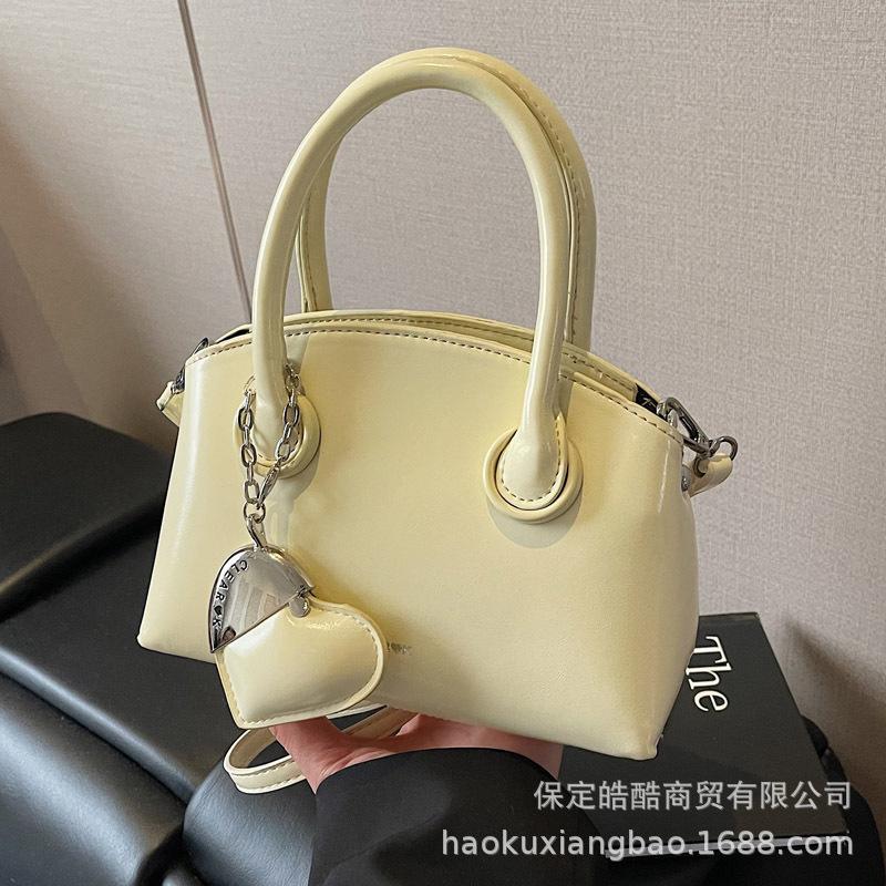 Large-capacity messenger tote bag, simple and versatile handbag, women's 2025 spring new fashion casual bucket bag