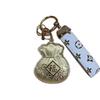 999 Fine Gold Fu Character Keychain and Handbag Pendant