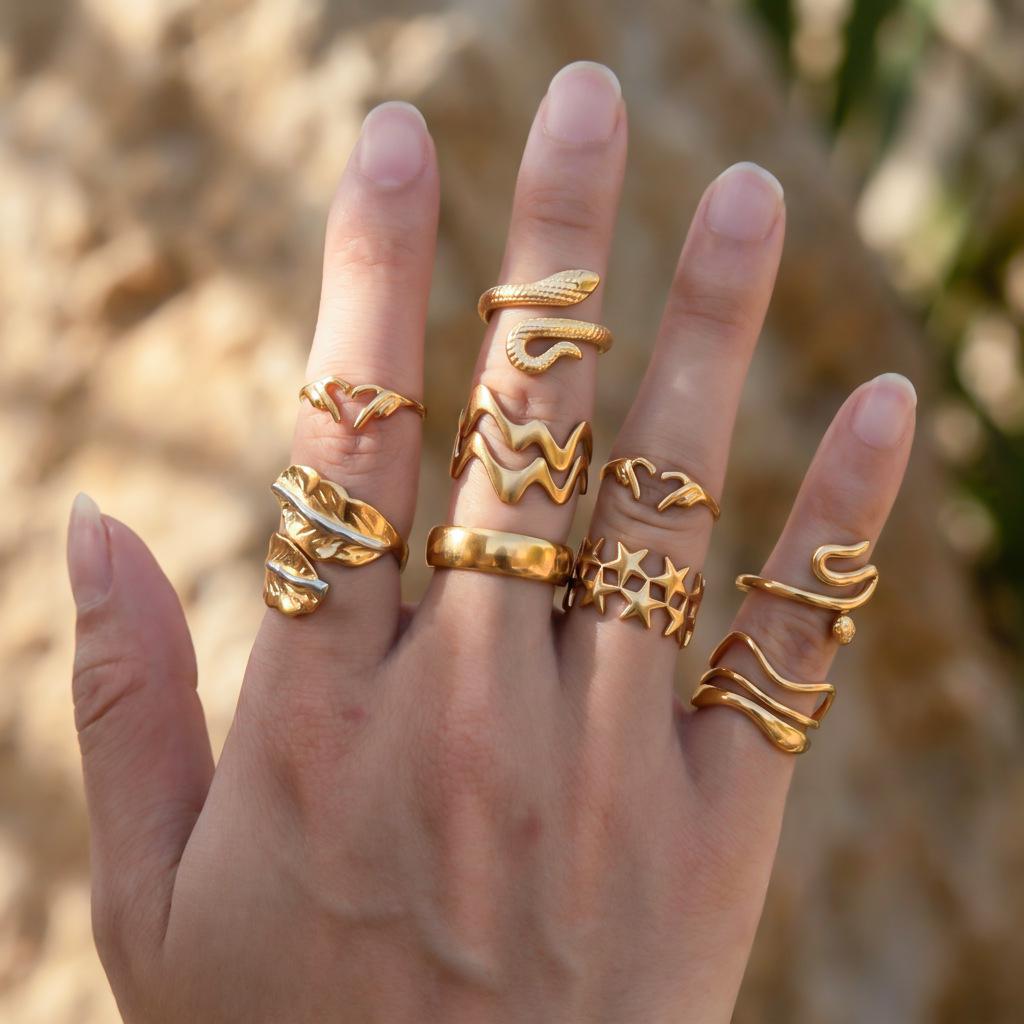 Gold Snake & Star Stainless Steel Adjustable Ring Set (9 Pieces)