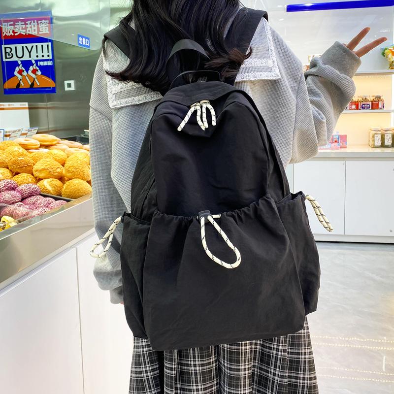 Schoolbag Solid Color Nylon Backpack Women's 1011 Summer New Large Capacity Middle and High School Student School Bag Lightweight Travel Bag