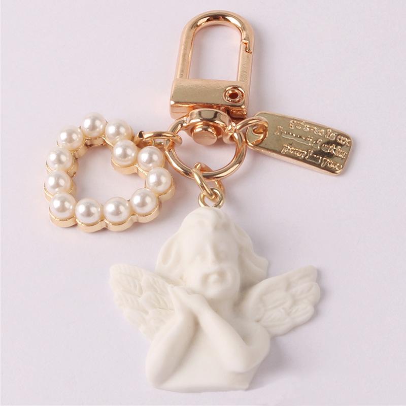 Charmante Engel-Schlüsselanhänger als besondere Gastgeschenke für Tauf-, Hochzeits- und Taufveranstaltungen