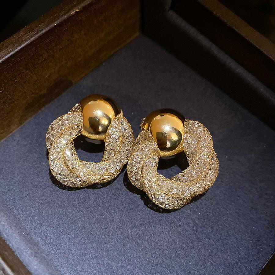 

European and American retro silver needle mesh twisted flower stud earrings simple fashion exquisite earrings light luxury high-end earrings women