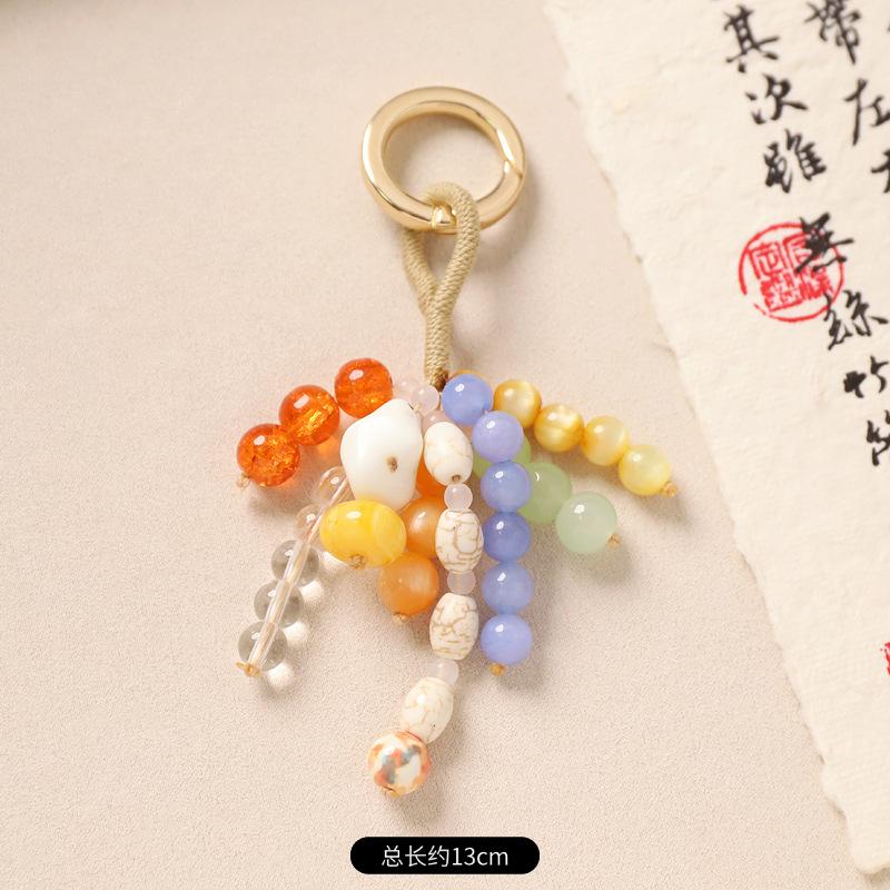 

Hand-woven crystal bag full of wish seeds Bodhi beaded keychain pendant literary bag pendant