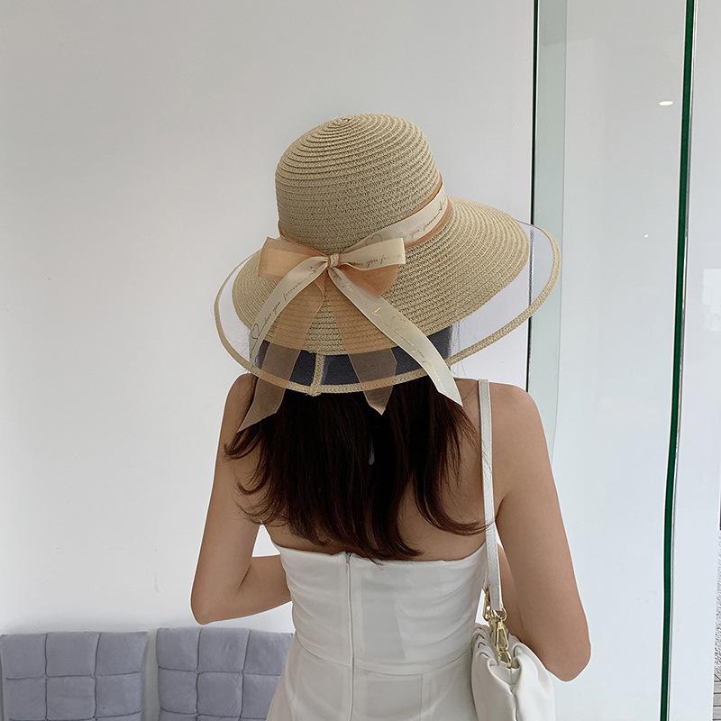 Wide Brim Bucket Hat with Elegant Black Bow - Breathable, Inelastic, and UPF Protective - Perfect for Beach, Travel, and Holiday Outings