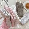 Pure Color Wool Knitted Thickened Butterfly Knot Pile-up Socks for Children, Suitable for Autumn and Winter, Providing Warmth.