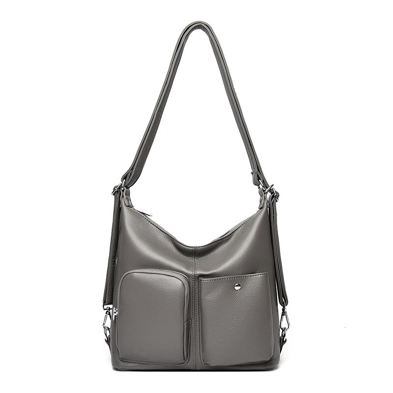 Die Retro-Umhängetasche aus weichem Leder ist eine modische Pendler-Einzelschultertasche, die schlicht und leicht ist.