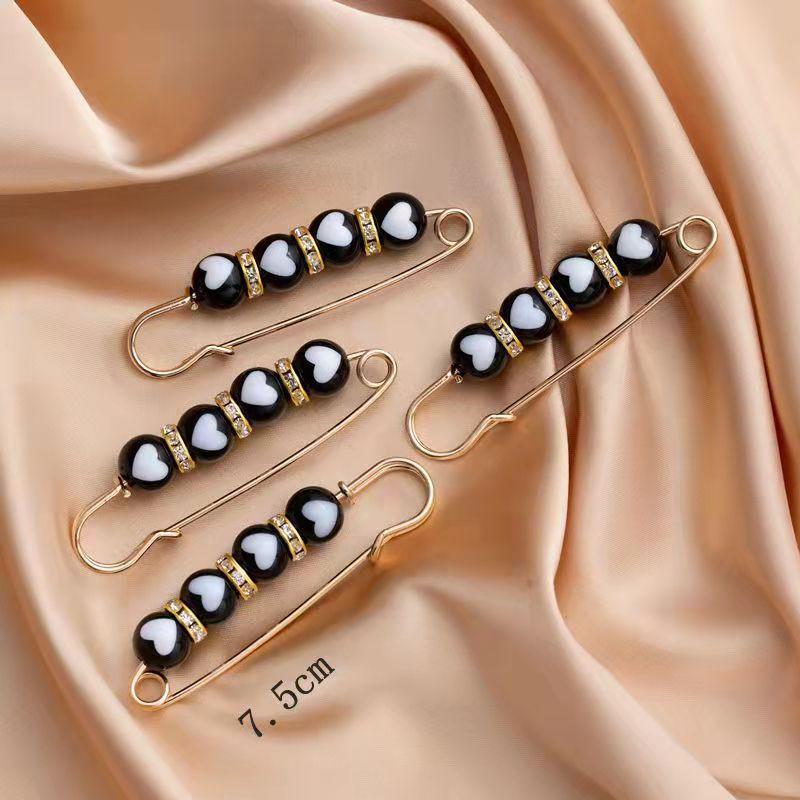 

Регулируемая брошь с пряжкой на талии: Эластичная булавка на поясе для надежной фиксации и предотвращения обнажения.