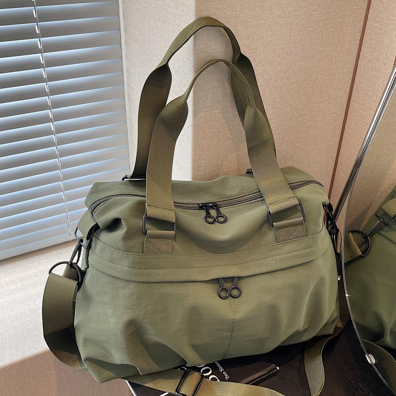 Japanese hand-held travel bags for men and women large-capacity short-distance travel cloth bags shoulder messenger bags fashion sports fitness bags