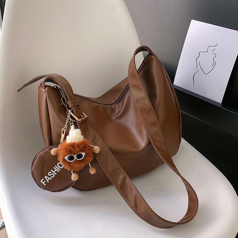 

New trend versatile women s shoulder armpit bag high texture dumpling bag fashionable personality leather oblique span bag One size коричневый
