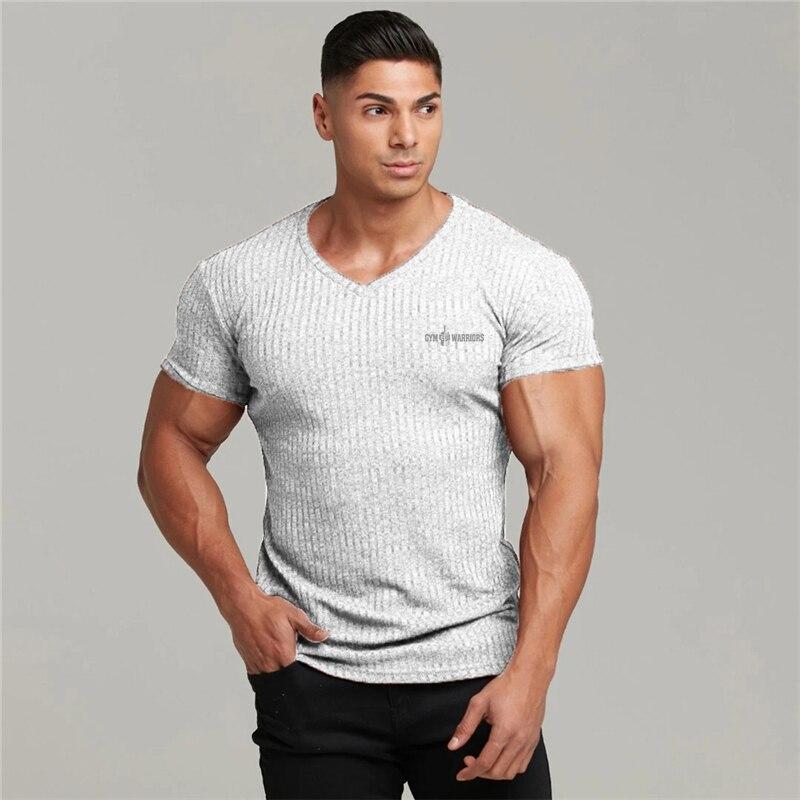 Muscleguys Men's Gym tops Summer Bodybuilding Short-sleeve Youthful Vitality Printed V-nesk Knitted Shirt Fashion Casual